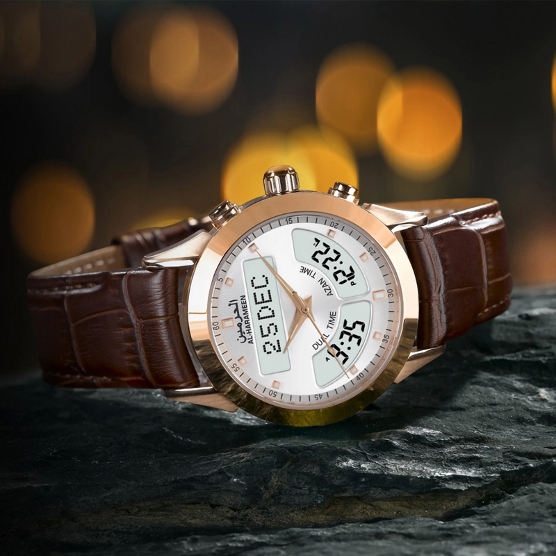 Al-harmeen Ha-6102 brown leather crocodile style with gold case bokeh shot on a black earthy rock with blurred lights in back